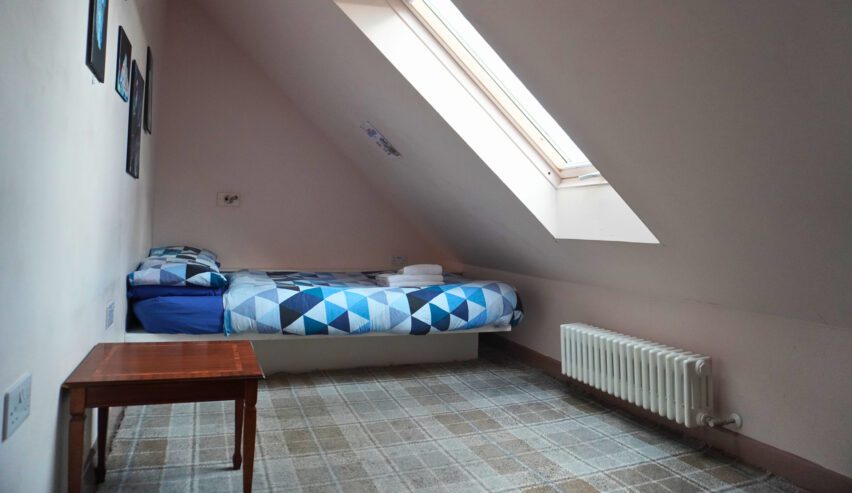 attic bedroom at Castle Rock Hostel