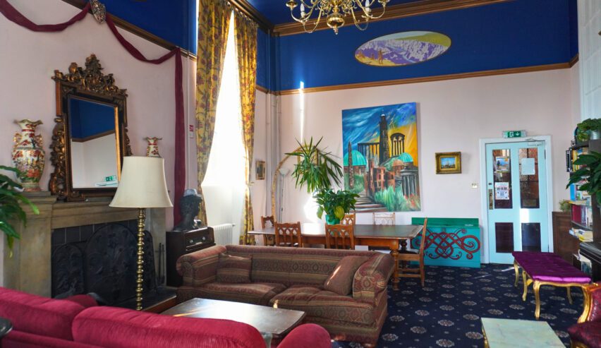 brightly coloured loumge at Castle Rock Hostel
