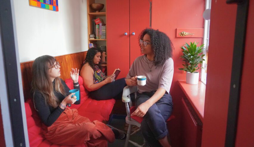chatting at Reception at Royal Mile Backpackers