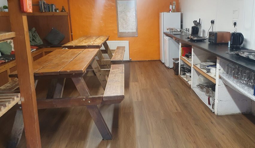 benches and tables at pentre bach bunkhouse in snowdonia
